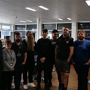 Barbering students smiling