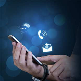 Picture of man clicking on a phone messaging devises 