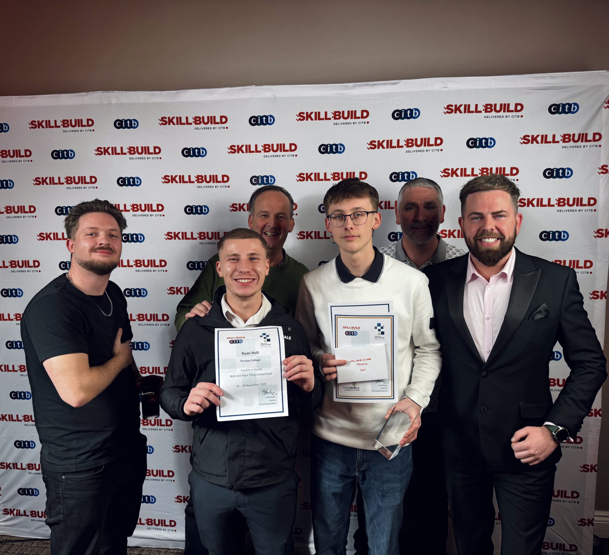 SkillBuild Winners - Preston College apprentices with their awards
