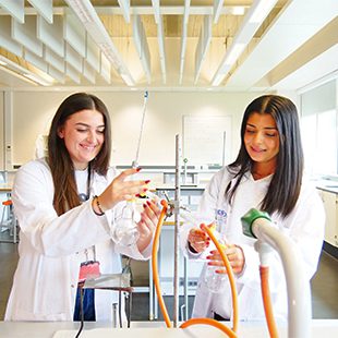 Two students in the science lab at Preston College