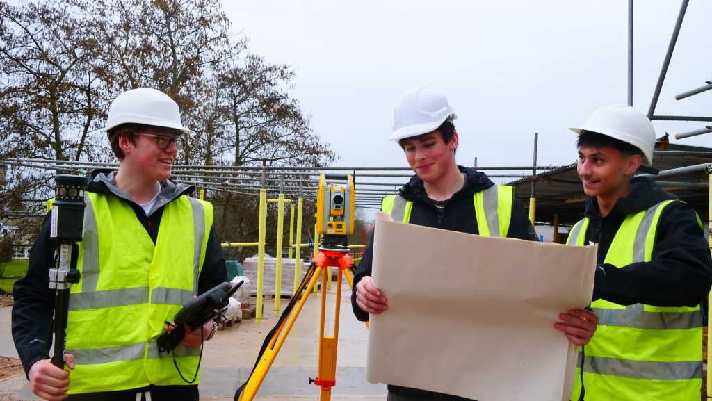 students outside construction department